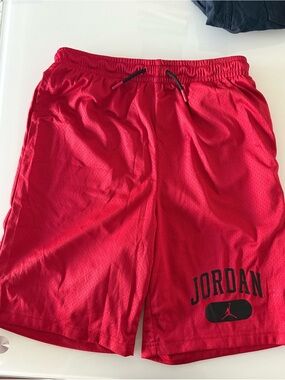 Jordan Red Men's Athletic Mesh Shorts with Black Logo